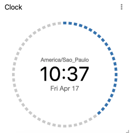 Clock widget example showing timezone, time, weekday, and a dotted-second ring